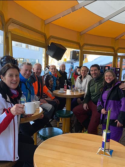 A group of Denplan dentists enjoying refreshments in a ski resort bar