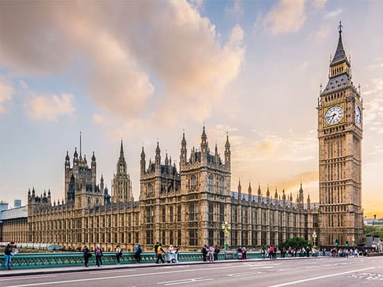 Big Ben clock tower in London, against a clear blue sky