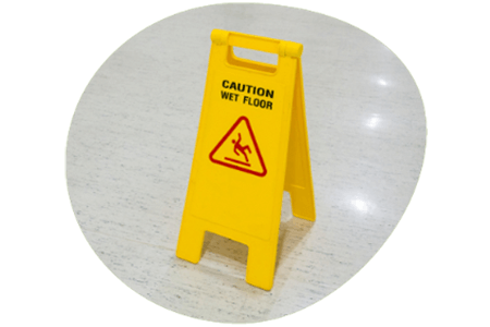 Health and safety sign for a wet floor