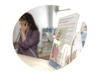 Dental practice receptionist and marketing materials