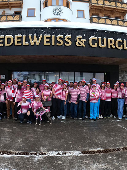 A large group of Denplan dentists and colleagues all dressed as Where's Wally